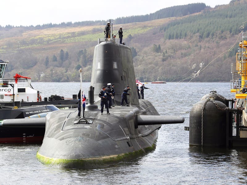 France accuses Britain of hiding in American lap in submarine